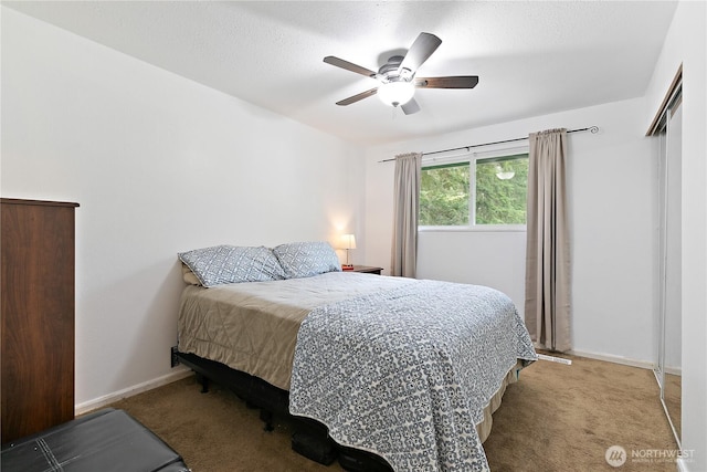 4909 95th Ave W, University Place, WA 98467 - carpeted bedroom featuring baseboards and ceiling fan