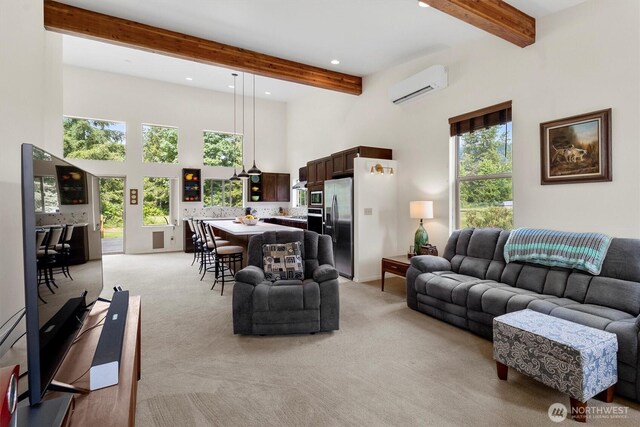 living room with a wall mounted air conditioner, beam ceiling, a towering ceiling, recessed lighting, and light colored carpet