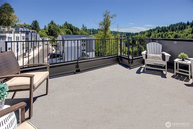 8826 NE 173rd Pl Unit C, Bothell, WA 98011 - view of patio with a balcony