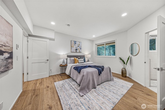 27923 NE 49th St, Redmond, WA 98053 - bedroom with light wood-type flooring, recessed lighting, and baseboards