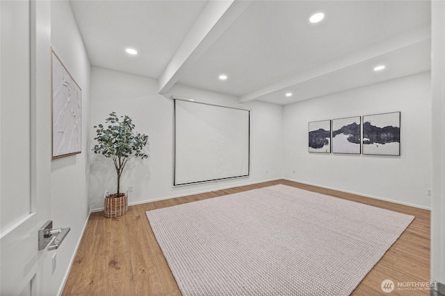 27923 NE 49th St, Redmond, WA 98053 - cinema room with beam ceiling, recessed lighting, wood finished floors, and baseboards