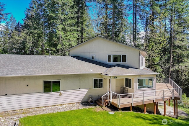 27923 NE 49th St, Redmond, WA 98053 - back of property featuring roof with shingles, a deck, and a yard