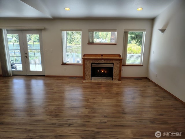659 Cain Lake Rd, Sedro Woolley, WA 98284 - unfurnished living room with plenty of natural light, wood finished floors, baseboards, and recessed lighting