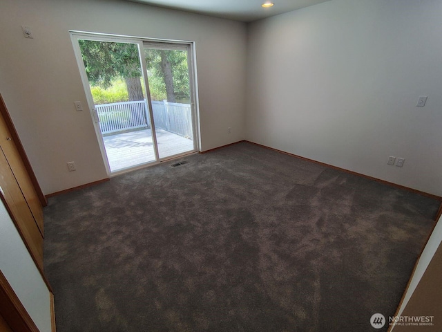659 Cain Lake Rd, Sedro Woolley, WA 98284 - empty room with baseboards and dark colored carpet