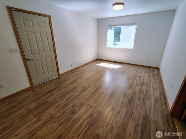 659 Cain Lake Rd, Sedro Woolley, WA 98284 - spare room featuring wood finished floors and baseboards