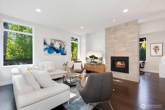 21955 SE 30th Pl, Sammamish, WA 98075 - living room featuring dark wood finished floors, baseboards, recessed lighting, and a tile fireplace