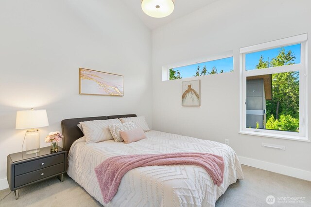 21955 SE 30th Pl, Sammamish, WA 98075 - bedroom with light colored carpet and baseboards