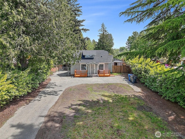 9819 Park Ave S, Tacoma, WA 98444 - back of property with fence and a deck