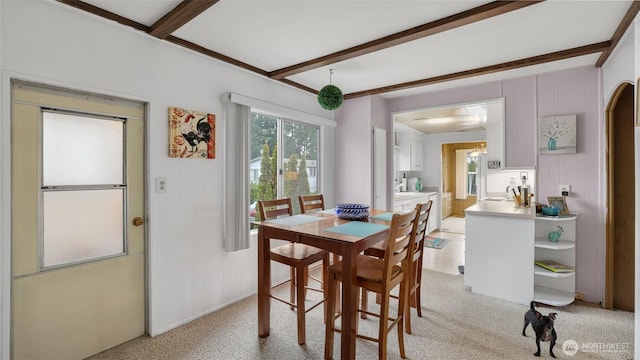 2101 S 324th St Unit 9, Federal Way, WA 98003 - dining space with beamed ceiling and light carpet