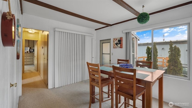 2101 S 324th St Unit 9, Federal Way, WA 98003 - dining area with carpet flooring and beamed ceiling