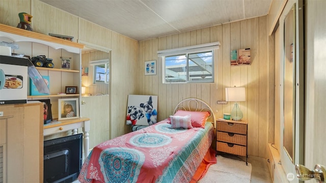 2101 S 324th St Unit 9, Federal Way, WA 98003 - bedroom with wood walls and carpet floors