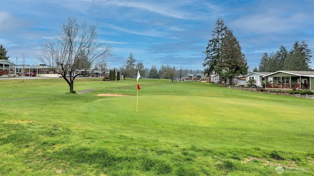 2101 S 324th St Unit 9, Federal Way, WA 98003 - surrounding community with a lawn, a putting green, a residential view, and golf course view