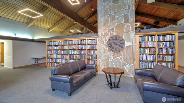 2101 S 324th St Unit 9, Federal Way, WA 98003 - sitting room featuring wooden ceiling, carpet, baseboards, and wall of books