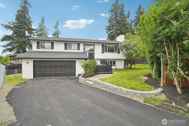 429 217th Pl SW, Bothell, WA 98021 - split foyer home featuring driveway, an attached garage, and a chimney
