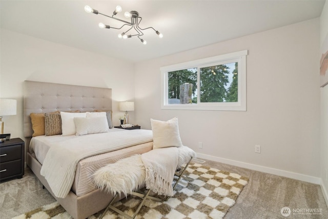 429 217th Pl SW, Bothell, WA 98021 - bedroom featuring a chandelier, light carpet, and baseboards