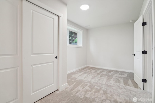429 217th Pl SW, Bothell, WA 98021 - unfurnished bedroom featuring light carpet and baseboards
