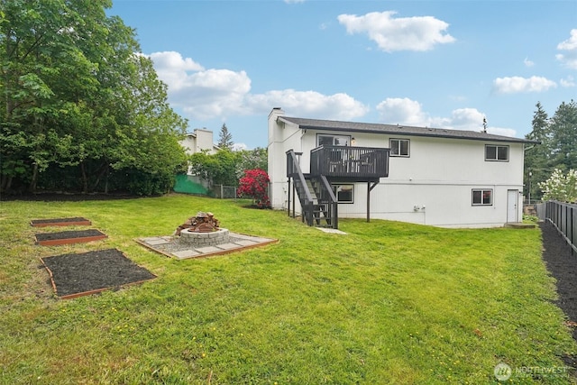 429 217th Pl SW, Bothell, WA 98021 - back of property with an outdoor fire pit, stairway, and a deck