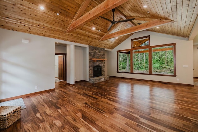 2075 NW Peterson Rd, Poulsbo, WA 98370 - unfurnished living room featuring wood ceiling, wood finished floors, baseboards, a fireplace, and a ceiling fan