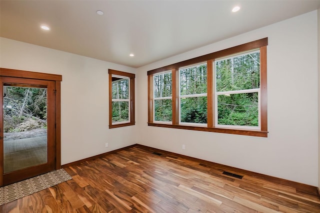 2075 NW Peterson Rd, Poulsbo, WA 98370 - spare room featuring recessed lighting, dark wood-style flooring, and baseboards