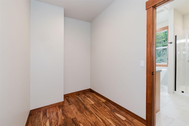 2075 NW Peterson Rd, Poulsbo, WA 98370 - spare room featuring baseboards and wood finished floors