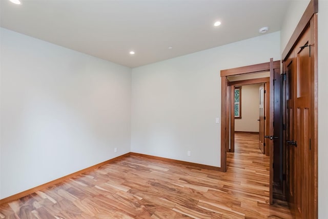 2075 NW Peterson Rd, Poulsbo, WA 98370 - empty room featuring light wood-type flooring, recessed lighting, baseboards, and a smoke detector