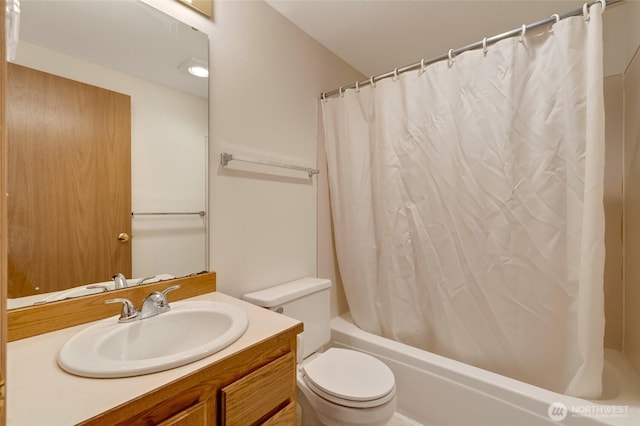 full bathroom with toilet, shower / tub combo, and vanity
