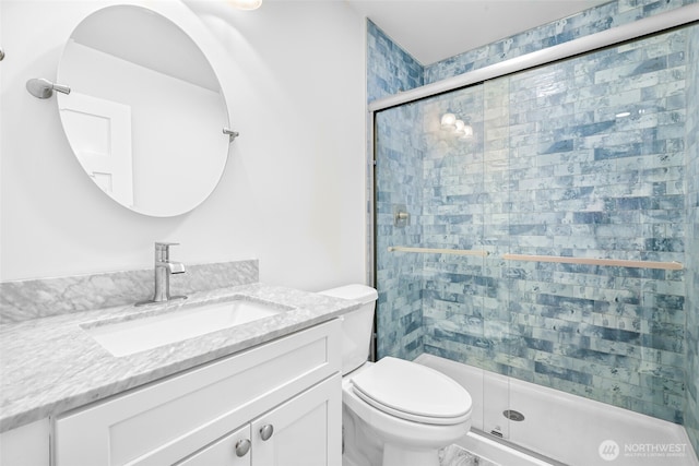 691 N W Camano Dr, Camano Island, WA 98282 - full bathroom with a shower stall, vanity, and toilet