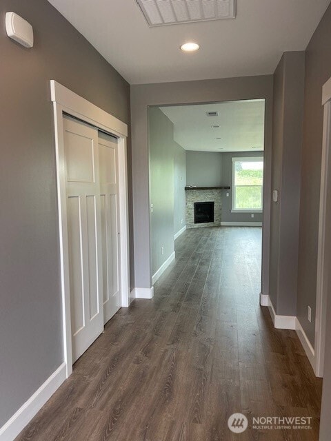 9 Columbia View Dr, Brewster, WA 98812 - hallway with dark wood-style floors, baseboards, and recessed lighting