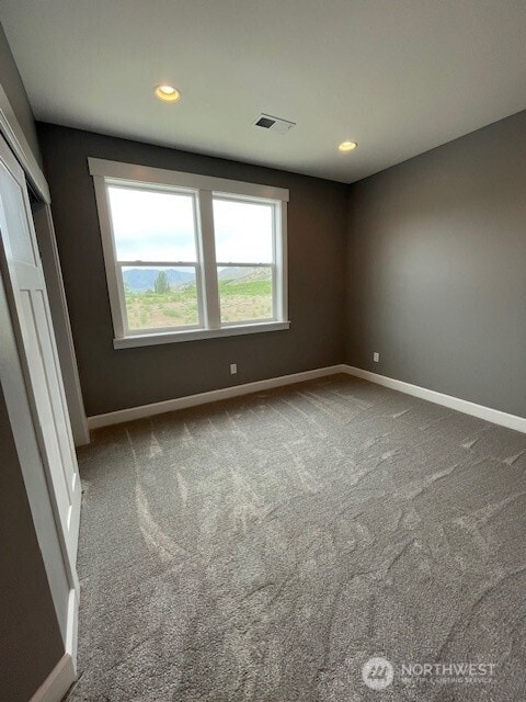 9 Columbia View Dr, Brewster, WA 98812 - carpeted empty room featuring baseboards and recessed lighting