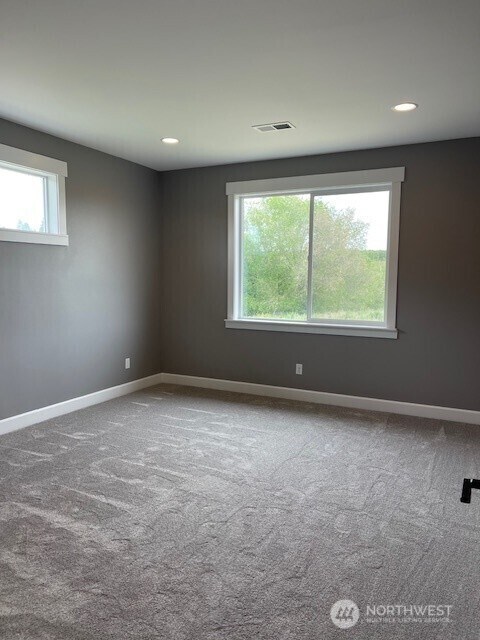 9 Columbia View Dr, Brewster, WA 98812 - carpeted spare room featuring baseboards and recessed lighting