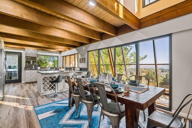 4706 Scenic Dr, Yakima, WA 98908 - sunroom / solarium featuring beam ceiling and healthy amount of natural light