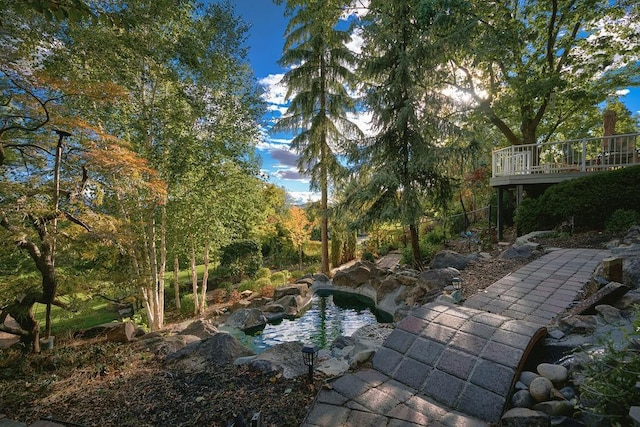4706 Scenic Dr, Yakima, WA 98908 - view of yard featuring a garden pond and a wooden deck