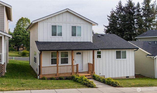 2080 Thornton St, Ferndale, WA 98248 - view of front of property with board and batten siding, covered porch, a shingled roof, and a front lawn