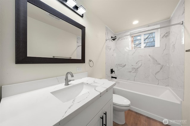 8322 Wabash Ave S, Seattle, WA 98118 - full bath featuring toilet, wood finished floors, tub / shower combination, and vanity