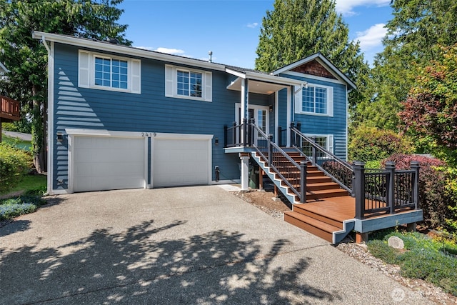 2419 53rd Street Ct NW, Gig Harbor, WA 98335 - raised ranch with a garage and asphalt driveway