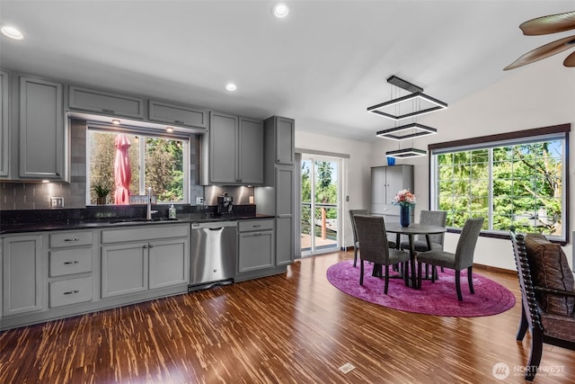 2419 53rd Street Ct NW, Gig Harbor, WA 98335 - kitchen featuring stainless steel dishwasher, gray cabinetry, a sink, dark countertops, and recessed lighting