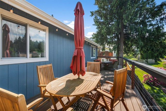 2419 53rd Street Ct NW, Gig Harbor, WA 98335 - wooden deck with outdoor dining space