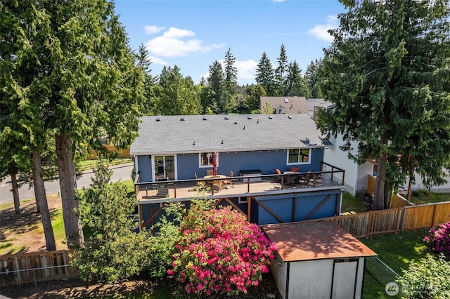 2419 53rd Street Ct NW, Gig Harbor, WA 98335 - rear view of property with a wooden deck and roof with shingles