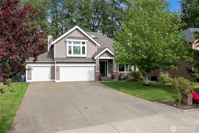 craftsman-style home featuring concrete driveway, roof with shingles, a front lawn, a chimney, and brick siding