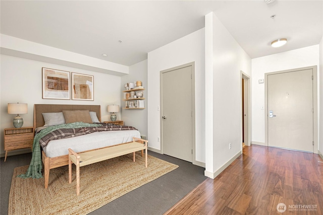 2960 Eastlake Ave E Unit 307, Seattle, WA 98102 - bedroom with dark wood-type flooring and baseboards