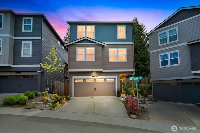 13125 13th Ave W Unit 6, Everett, WA 98204 - view of front of property featuring a garage and driveway