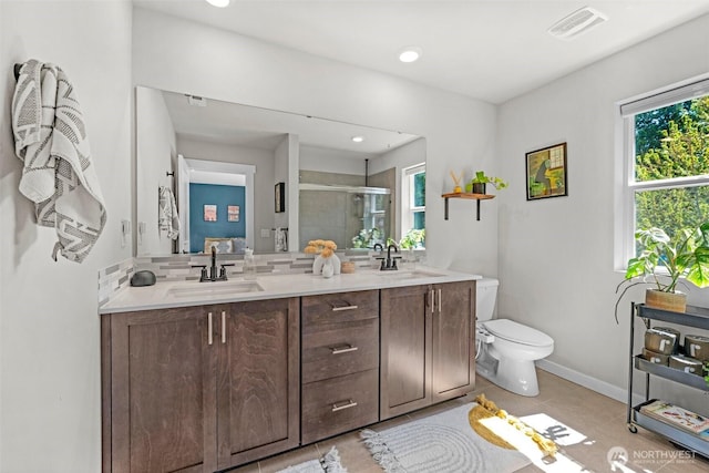 13125 13th Ave W Unit 6, Everett, WA 98204 - full bath featuring a shower stall, toilet, plenty of natural light, double vanity, and recessed lighting