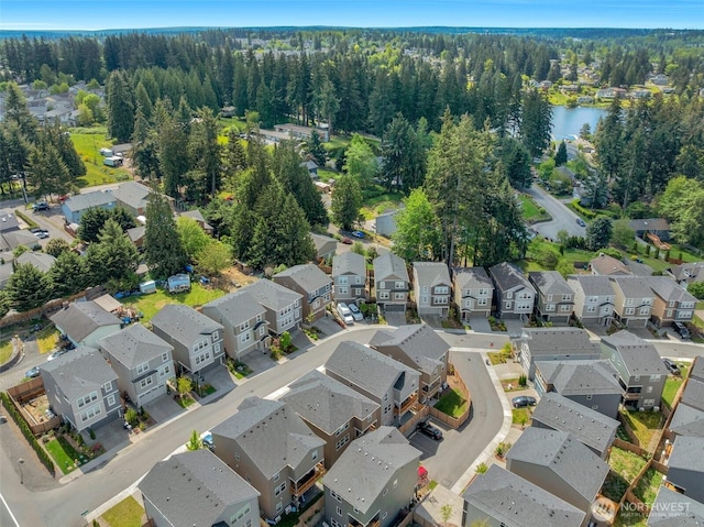 13125 13th Ave W Unit 6, Everett, WA 98204 - aerial overview of property's location with nearby suburban area, a nearby body of water, and a forest