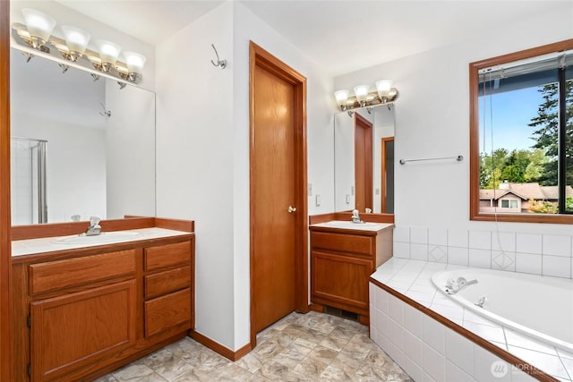 18323 23rd Dr SE, Bothell, WA 98012 - full bathroom featuring two vanities and a garden tub