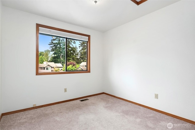 18323 23rd Dr SE, Bothell, WA 98012 - spare room featuring carpet floors and baseboards