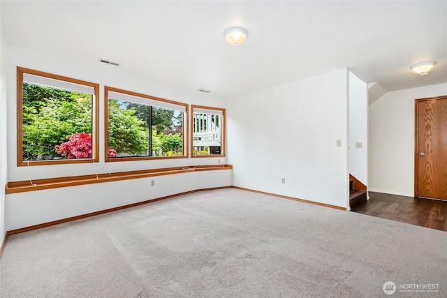 18323 23rd Dr SE, Bothell, WA 98012 - carpeted spare room featuring baseboards and stairway