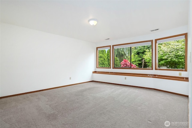 18323 23rd Dr SE, Bothell, WA 98012 - carpeted spare room with healthy amount of natural light and baseboards