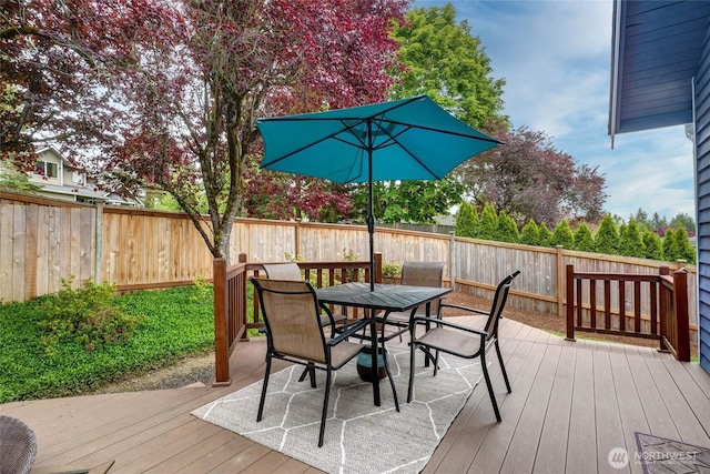 18323 23rd Dr SE, Bothell, WA 98012 - wooden terrace with a fenced backyard and outdoor dining space