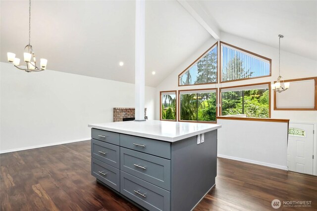 18323 23rd Dr SE, Bothell, WA 98012 - kitchen with a chandelier, gray cabinets, beam ceiling, dark wood-style floors, and high vaulted ceiling