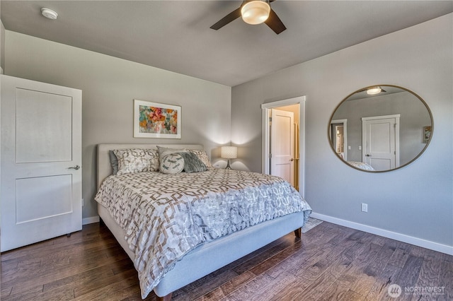 bedroom featuring wood finished floors, baseboards, and a ceiling fan